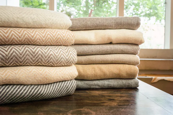 Cashmere blankets and throws stacked